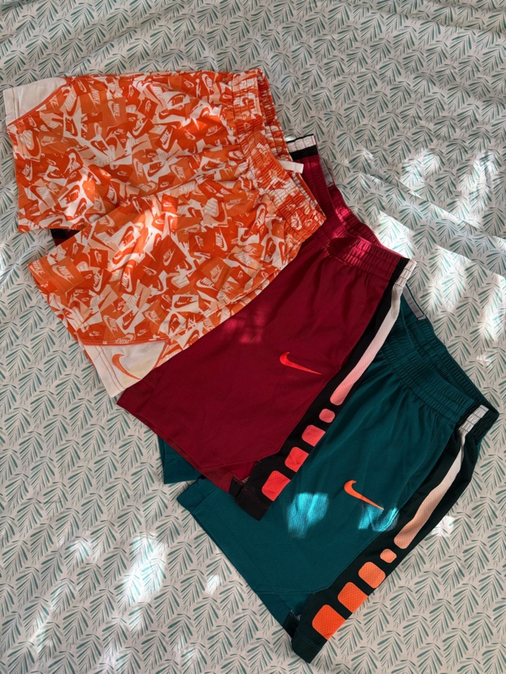3 pairs boys Nike shorts, size medium.